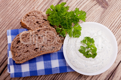 fresh tasty herbal creme cheese and bread