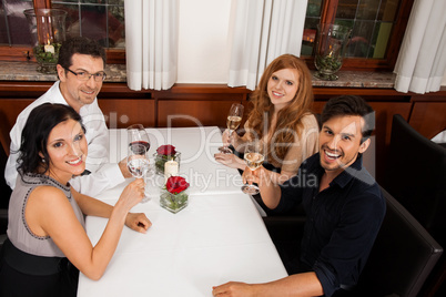 smiling happy people friends in restaurant