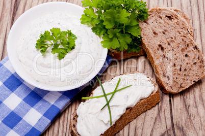 fresh tasty herbal creme cheese and bread