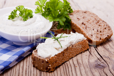 fresh tasty herbal creme cheese and bread