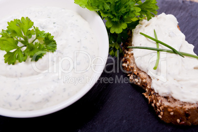 fresh tasty herbal creme cheese and bread