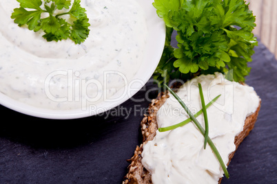 fresh tasty herbal creme cheese and bread