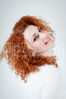 attractive young redhead woman smiling portrait attractive young redhead woman smiling portrait