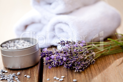fresh lavender white towel and bath salt on wooden background