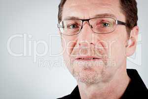 attractive adult man with glasses and black shirt