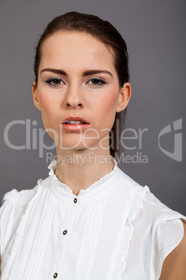 young attractive brunette woman in studio portrait