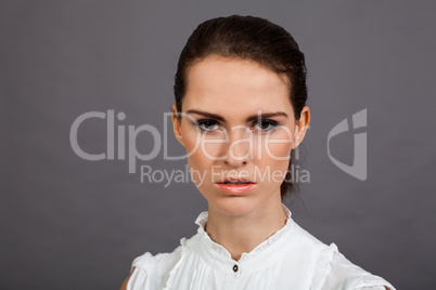 young attractive brunette woman in studio portrait