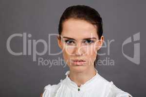 young attractive brunette woman in studio portrait