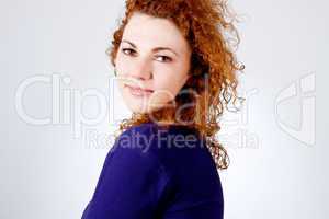 attractive young redhead woman smiling portrait