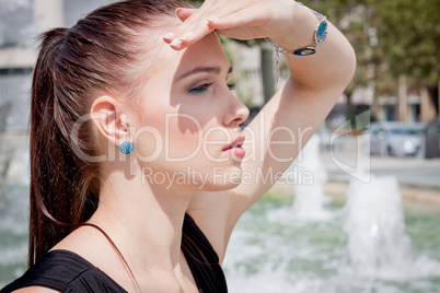 attractive brunette young woman in summer outdoor