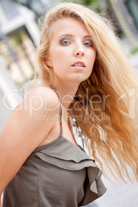 happy young blonde woman with hat outdoor summertime