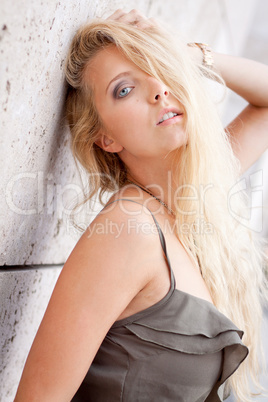 happy young blonde woman with hat outdoor summertime