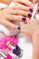 manicure making in beauty spa salon