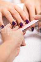 manicure making in beauty spa salon