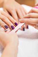 manicure making in beauty spa salon