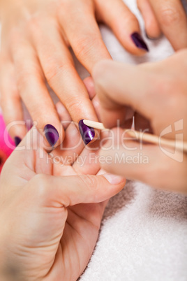 manicure making in beauty spa salon