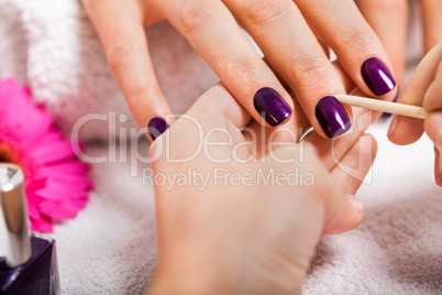 manicure making in beauty spa salon