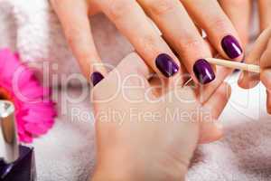 manicure making in beauty spa salon