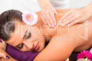 Beautiful woman having a back massage