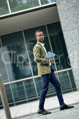 young successful african business man outdoor in summer