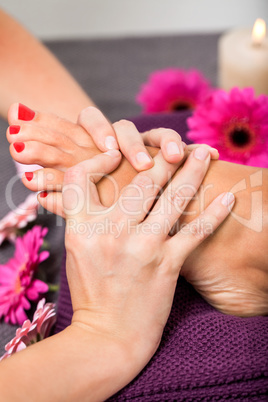 Woman having a pedicure treatment at a spa