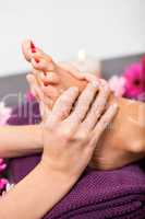 Woman having a pedicure treatment at a spa