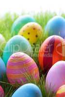 Green Grass With Many Colorful Easter Eggs For Seasons Greetings