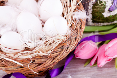 festive traditional easter egg decoration ribbon and tulips