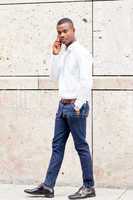 young successfil african businessman with mobilephone