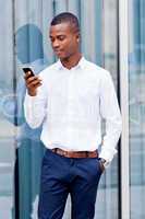 young successfil african businessman with mobilephone