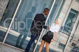 young successful business man and woman outdoor