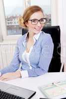 young successful business woman in office