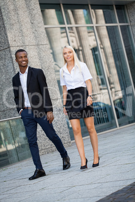 young successful business man and woman outdoor