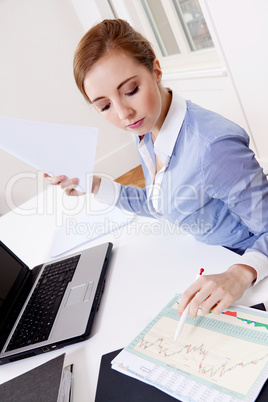 young successful business woman in office young successful business woman in office