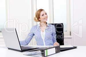 young successful business woman in office