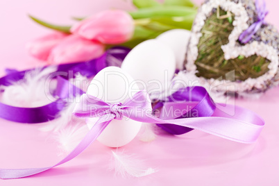 festive traditional easter egg decoration ribbon and tulips