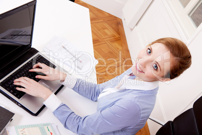 young successful business woman in office