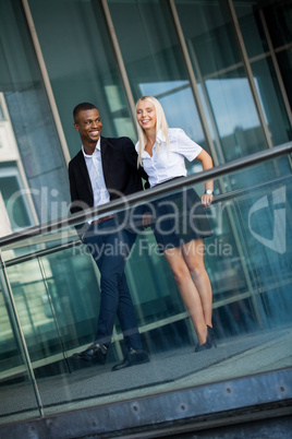 young successful business man and woman outdoor