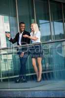 young successful business man and woman outdoor