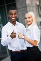 young smiling african man and blond woman