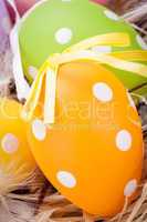 colorful easter egg decoration on wooden background