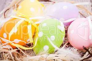 colorful easter egg decoration on wooden background