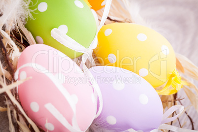 colorful easter egg decoration on wooden background