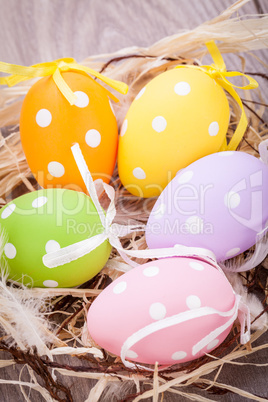 colorful easter egg decoration on wooden background