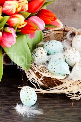 festive traditional easter egg decoration ribbon and tulips