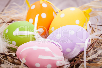 colorful easter egg decoration on wooden background