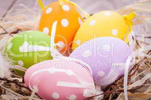 colorful easter egg decoration on wooden background