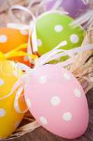 colorful easter egg decoration on wooden background