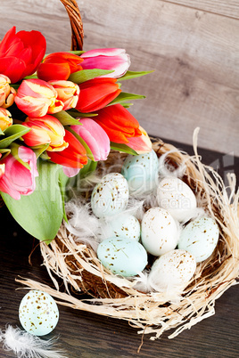 festive traditional easter egg decoration ribbon and tulips