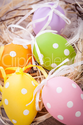 colorful easter egg decoration on wooden background